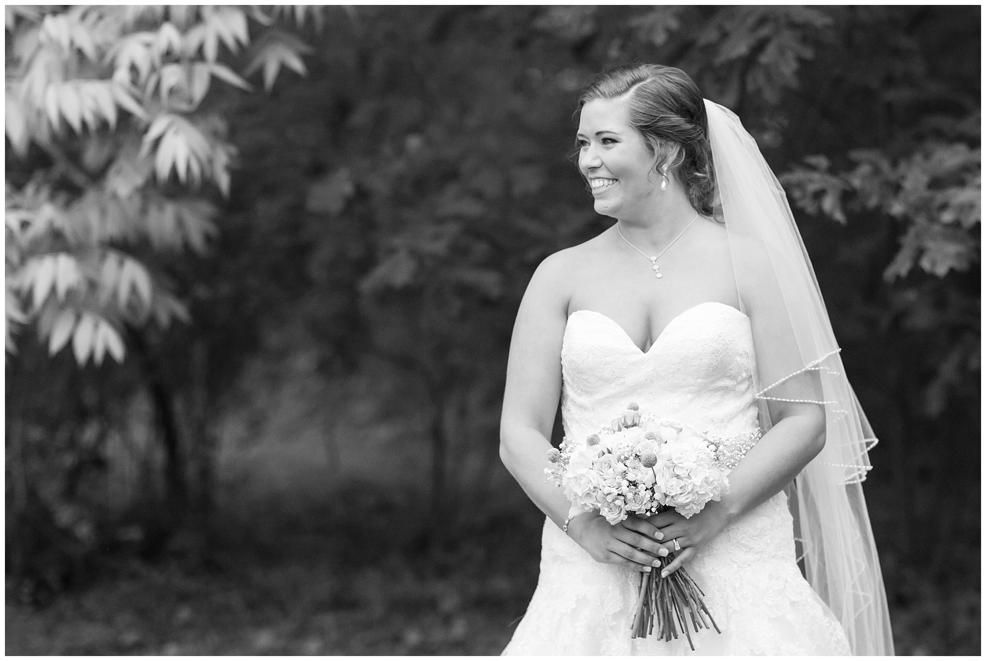 smiling bride in black and white
