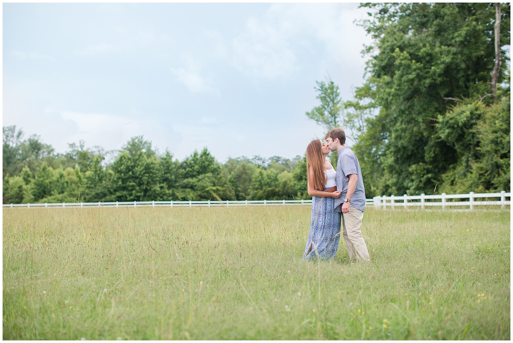 couple in beautiful field at back bay farms